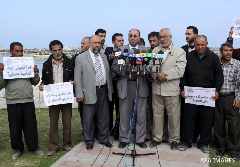 Palestinian official of the Ministry of Agriculture delivers speech during a press conference about the impact of the fuel crisis on the fisherman, in Gaza City, on Apr. 03, 2012. Photo by Mohammed Asad