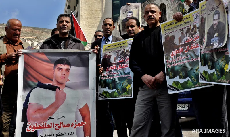 Palestinians participate in a demonstration in solidarity with prisoners jailed in Israel, in the West Bank city of Nablus, Apr. 03, 2012. Photo by Nedal Shtieh