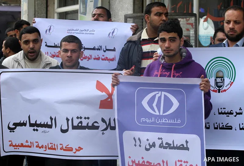 Palestinian journalists protest against arrest of the journalist Yousef Al Shaib in the West Bank, today in Gaza City on Apr. 04, 2012. Photo by Mohammed Asad