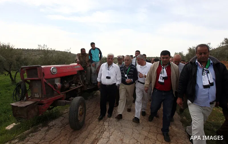 Palestinian Prime Minister Salam Fayyad arrives to pay a visit to support Palestinian farmers in the Yanun village near the West Bank City of Nablus, 05 April 2012. The village was temporarily abandoned by its residents...