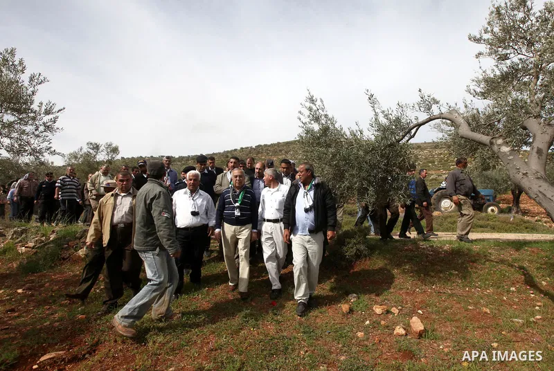 Palestinian Prime Minister Salam Fayyad arrives to pay a visit to support Palestinian farmers in the Yanun village near the West Bank City of Nablus, 05 April 2012. The village was temporarily abandoned by its residents...