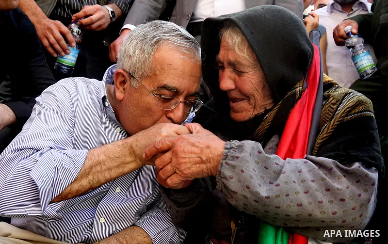 Palestinian Prime Minister Salam Fayyad arrives to pay a visit to support Palestinian farmers in the Yanun village near the West Bank City of Nablus, 05 April 2012. The village was temporarily abandoned by its residents...