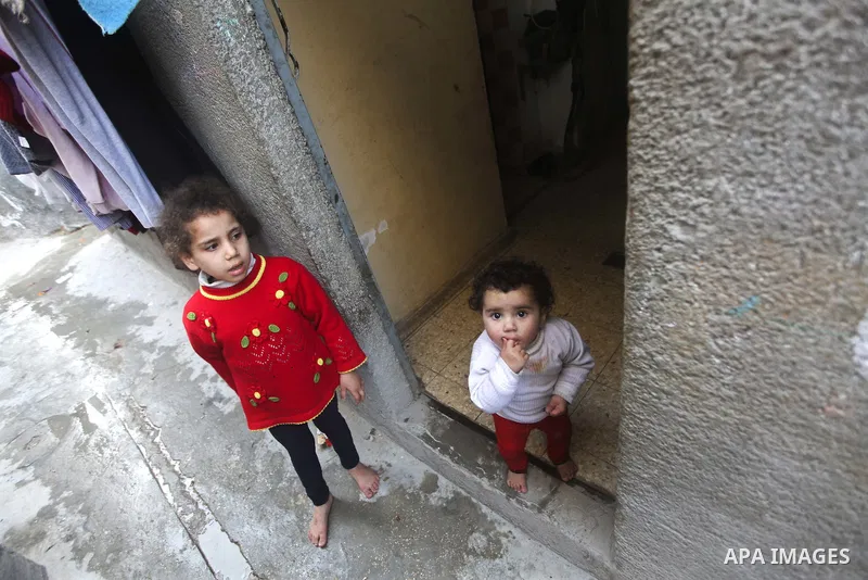 Palestinian children play in the streets of the Jabaliya refugee camp, northern Gaza Strip, 05 April 2012. The United Nations Relief and Works Agency (UNRWA) states that the Israeli blockade on Gaza has made life more di...
