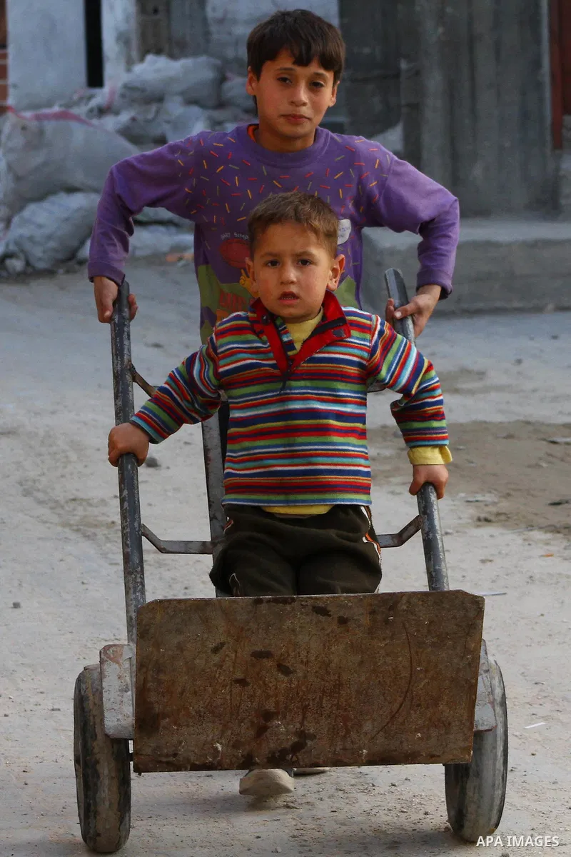 Palestinian children play in the streets of the Jabaliya refugee camp, northern Gaza Strip, 05 April 2012. The United Nations Relief and Works Agency (UNRWA) states that the Israeli blockade on Gaza has made life more di...