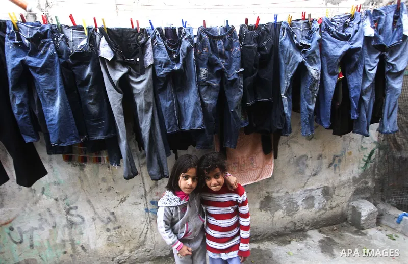 Palestinian children play in the streets of the Jabaliya refugee camp, northern Gaza Strip, 05 April 2012. The United Nations Relief and Works Agency (UNRWA) states that the Israeli blockade on Gaza has made life more di...
