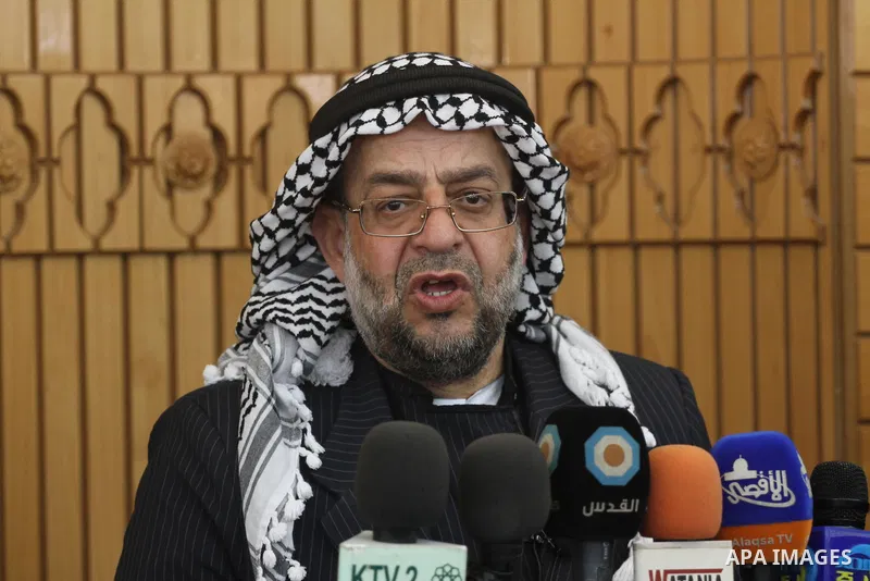 A head of Islamic Youth delegation which come from Arab countries attends Friday prayers at a mosque with Palestinian Prime Minister in Gaza Strip, Ismail Haniya in Gaza City on April 06, 2012. Photo by Mohammed Asad