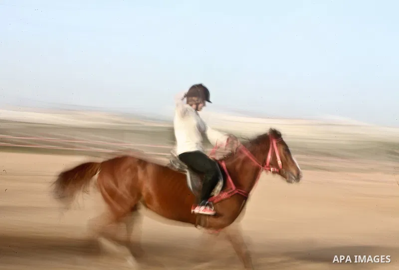 A Palestinian boy rides a horse during a championship at Gaza Horse Club in Gaza Strip, 06 April 2012. The clubs is home to some 54 horses and open for the training of male and female children aged between 12 to 23 years...