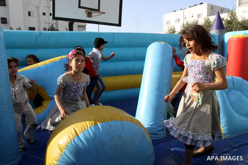 Palestinian children enjoy during celebrations marking Palestinian Children's Day in Gaza City in Gaza city, 06 April 2012. Photo by Mohammed Asad