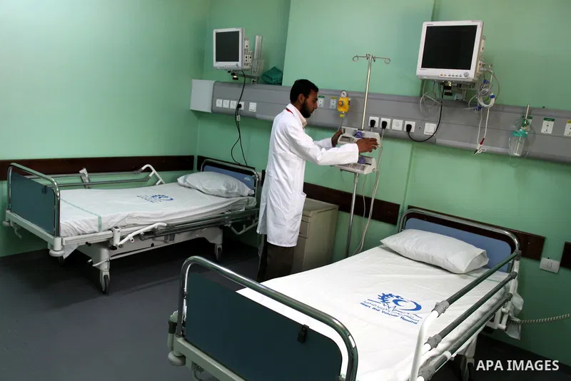 Palestinian Prime Minister in Gaza Strip, Ismail Haniya, (not seen) attends the opening of the public service of the hospital Heart and blood vessels in Gaza City, on Apr. 08, 2012. Photo by Mohammed Asad