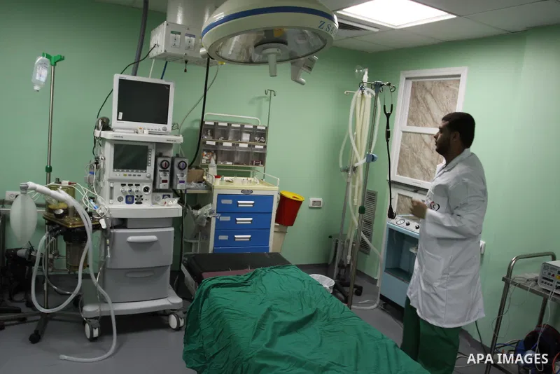 Palestinian Prime Minister in Gaza Strip, Ismail Haniya, (not seen) attends the opening of the public service of the hospital Heart and blood vessels in Gaza City, on Apr. 08, 2012. Photo by Mohammed Asad