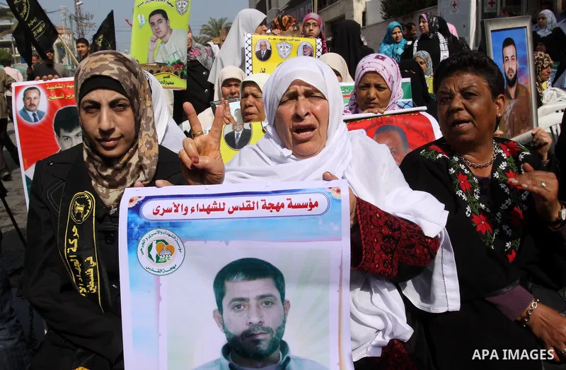 Palestinian prisoner Hanaa Shalabi participate demonstration in solidarity with prisoners jailed in Israel, during a weekly activity calling for their liberty at the Red Cross headquarters in Gaza City on Apr. 09, 2012....