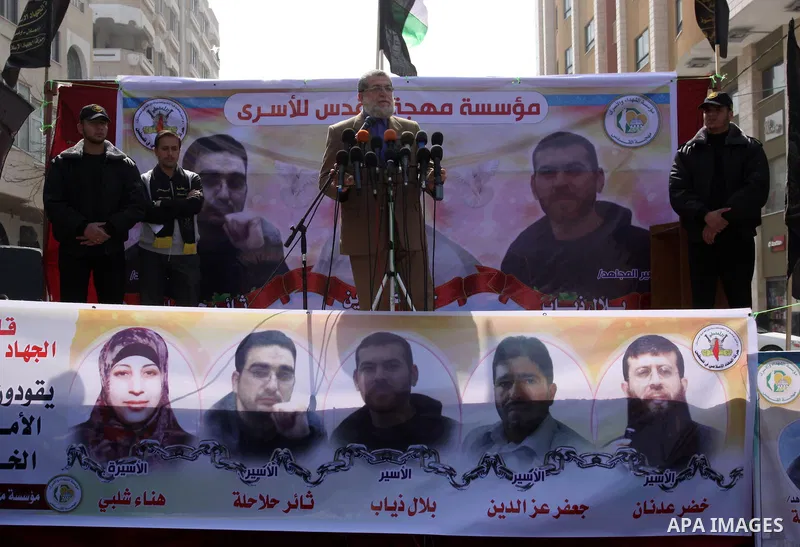 Palestinian official, speaks during demonstration in solidarity with prisoners jailed in Israel, during a weekly activity calling for their liberty at the Red Cross headquarters in Gaza City on Apr. 09, 2012. Photo by Mo...