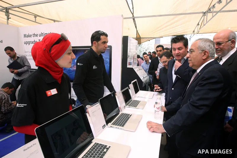 Palestinian Prime Minister, Salam Fayyad, attends the opining Engineering Day's ans Technological Day's in the Birzeit University in the West Bank city of Ramallah , on Apr. 09, 2012. Photo by Mustafa Abu Daya