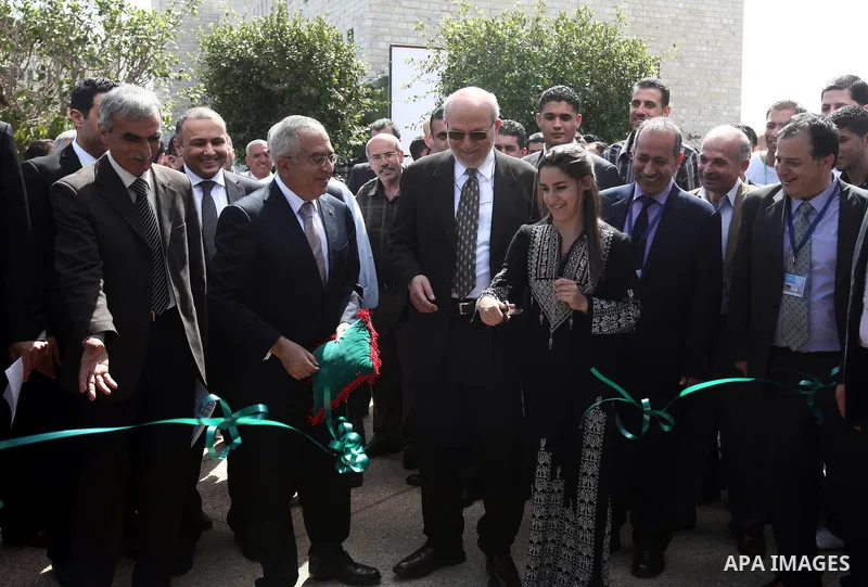 Palestinian Prime Minister, Salam Fayyad, attends the opining Engineering Day's ans Technological Day's in the Birzeit University in the West Bank city of Ramallah , on Apr. 09, 2012. Photo by Mustafa Abu Daya