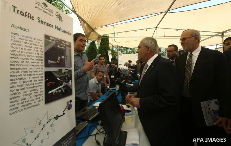 Palestinian Prime Minister, Salam Fayyad, attends the opining Engineering Day's ans Technological Day's in the Birzeit University in the West Bank city of Ramallah , on Apr. 09, 2012. Photo by Mustafa Abu Daya