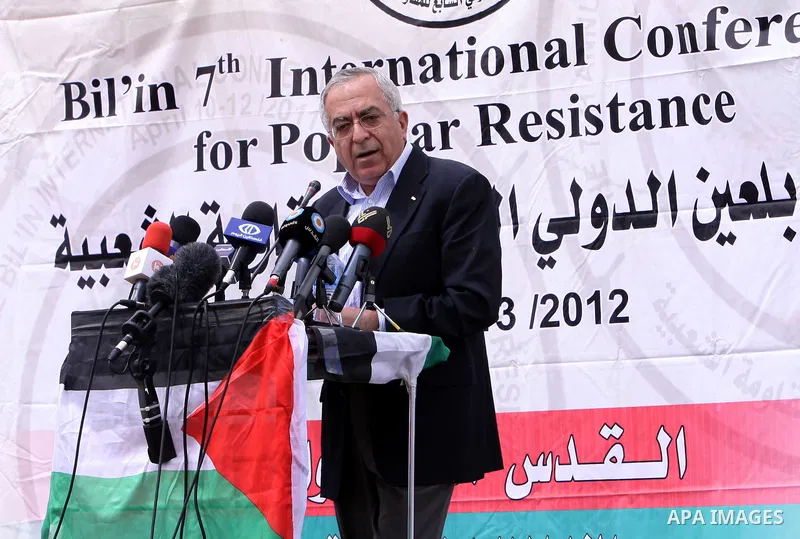 Palestinian Prime Minister Salam Fayyad, participates in the Sixth International Conference of the Bil'in popular resistance, in the village of Bil'in, in the West Bank city of Ramallah April 10, 2012. Photo by Mustafa A...