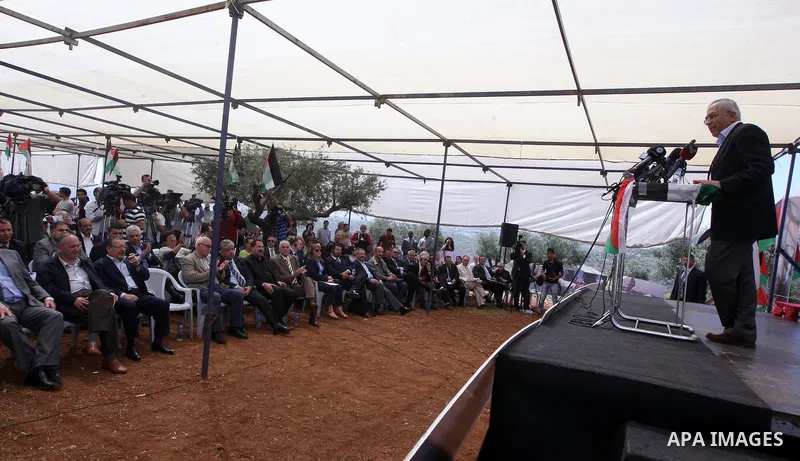 Palestinian Prime Minister Salam Fayyad, participates in the Sixth International Conference of the Bil'in popular resistance, in the village of Bil'in, in the West Bank city of Ramallah April 10, 2012. Photo by Mustafa A...