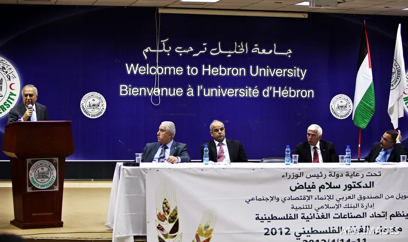 Palestinian Prime Minister Salam Fayyad attend Opening Ceremony of the food industry exhibition at the University of Hebron in west bank city of Hebron on April 11, 2012 Fayyad Inspect the first exhibition of agricultura...