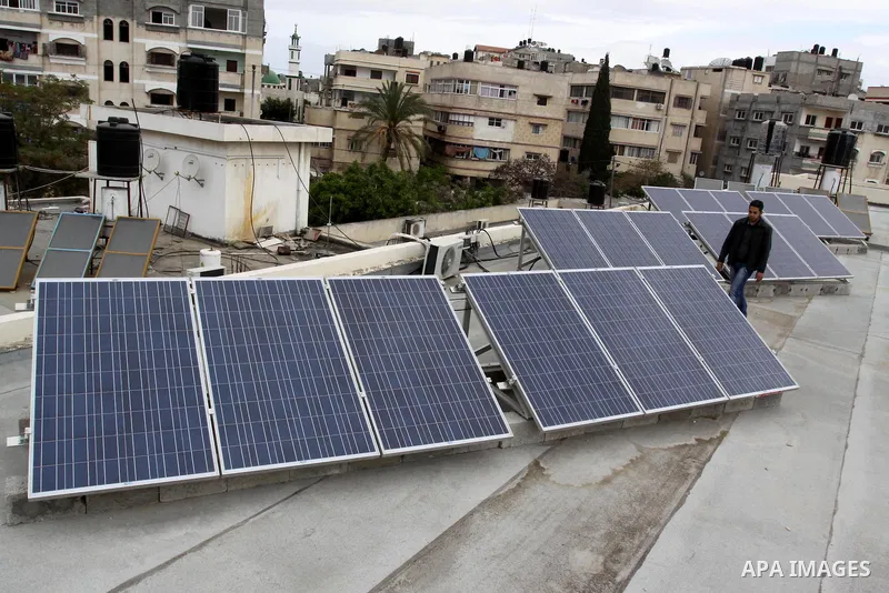 Palestinian civil society organizations "NGOs" donate to project supply of solar panels to the run of Medical equipment in Gaza hospitals, in Gaza City, on April, 12, 2012. Photo by Mohammed Asad