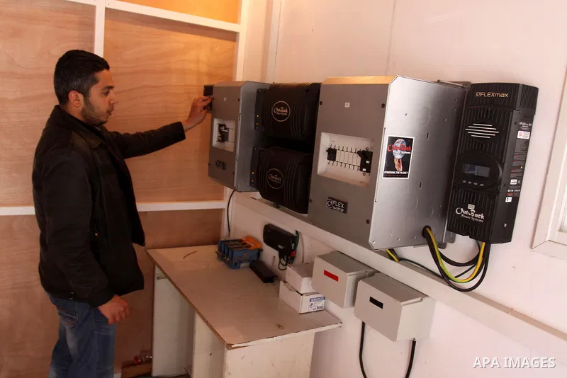Palestinian civil society organizations "NGOs" donate to project supply of solar panels to the run of Medical equipment in Gaza hospitals, in Gaza City, on April, 12, 2012. Photo by Mohammed Asad