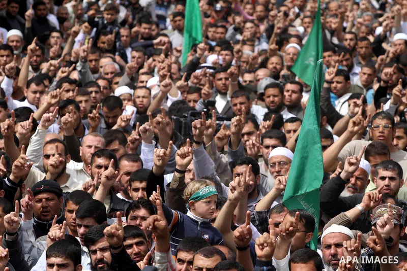 Palestinian Hamas supporters take part in a rally in Jabalya, in the northern Gaza Strip, April 13, 2012, calling for the release of Palestinian prisoners from Israeli jails. Photo by Mohammed Asad