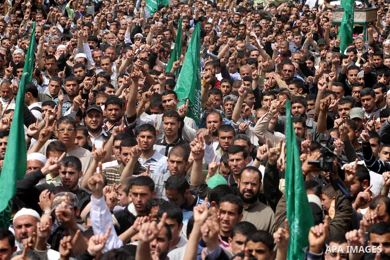 Palestinian Hamas supporters take part in a rally in Jabalya, in the northern Gaza Strip, April 13, 2012, calling for the release of Palestinian prisoners from Israeli jails. Photo by Mohammed Asad