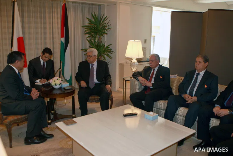 Palestinian President, Mahmoud Abbas (Abu Mazen) meets with Vice-President of the Football Association of Japan, in Tokyo, on April, 13, 2012. Photo by Thaer Ganaim