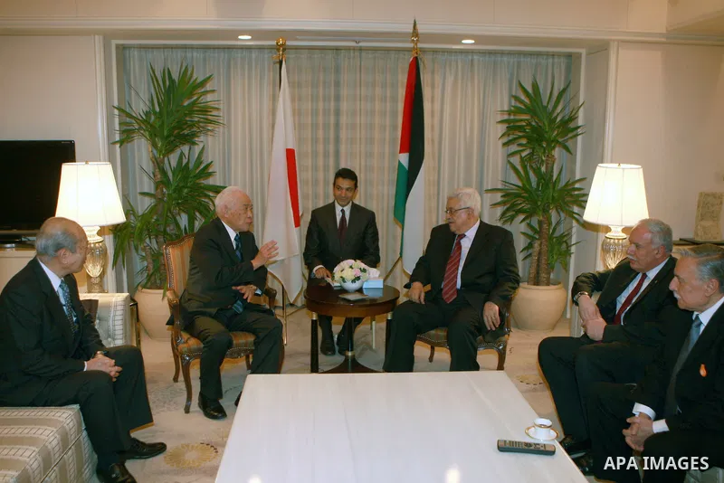 Palestinian President, Mahmoud Abbas (Abu Mazen) meets with former Japanese envoy to the peace process, tattoos Arima in Tokyo, on April, 13, 2012. Photo by Thaer Ganaim