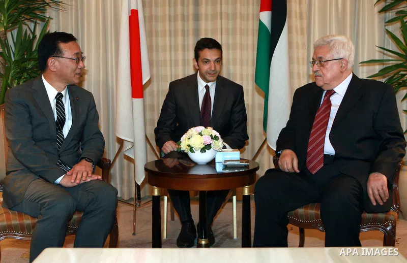 Palestinian President, Mahmoud Abbas (Abu Mazen) meets with member of parliament for the opposition Liberal Democrats, Tarokono, in Tokyo, on April, 13, 2012. Photo by Thaer Ganaim