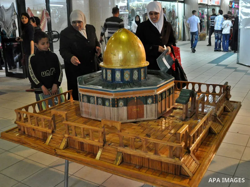Palestinians participate in an exhibition in the first Palestinian Heritage Jerusalem, in the West Bank city of Nablus, April. 14, 2012. Photo by Nedal Shtieh.