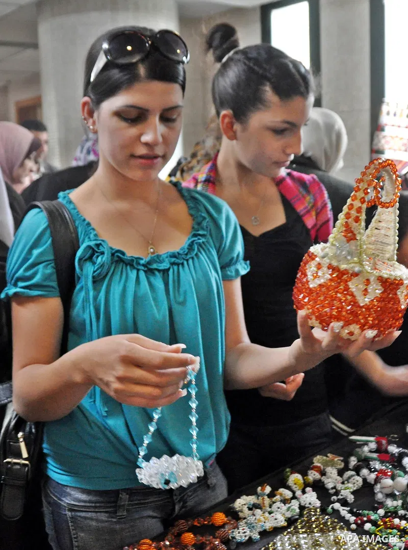 Palestinians participate in an exhibition in the first Palestinian Heritage Jerusalem, in the West Bank city of Nablus, April. 14, 2012. Photo by Nedal Shtieh.