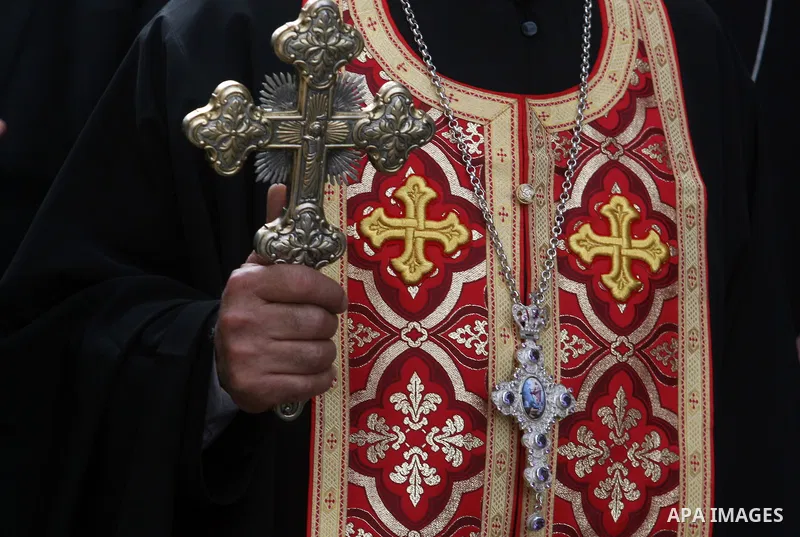 Palestinian Christians take part in the "Holy Fire" procession on the eve of Orthodox Easter in the West Bank city of Ramallah on April 14, 2012. The date of Orthodox Easter is calculated differently than by the Roman Ca...