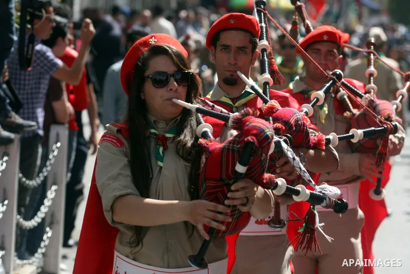 Palestinian Christians take part in the "Holy Fire" procession on the eve of Orthodox Easter in the West Bank city of Ramallah on April 14, 2012. The date of Orthodox Easter is calculated differently than by the Roman Ca...