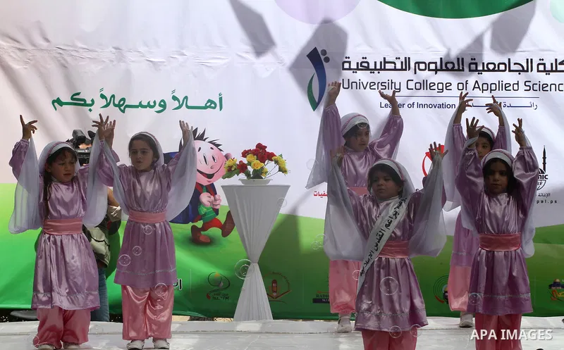 Palestinian children take part in a celebration to mark the International Children Day in Gaza city on April, 15, 2012. Photo by Mohammed Asad
