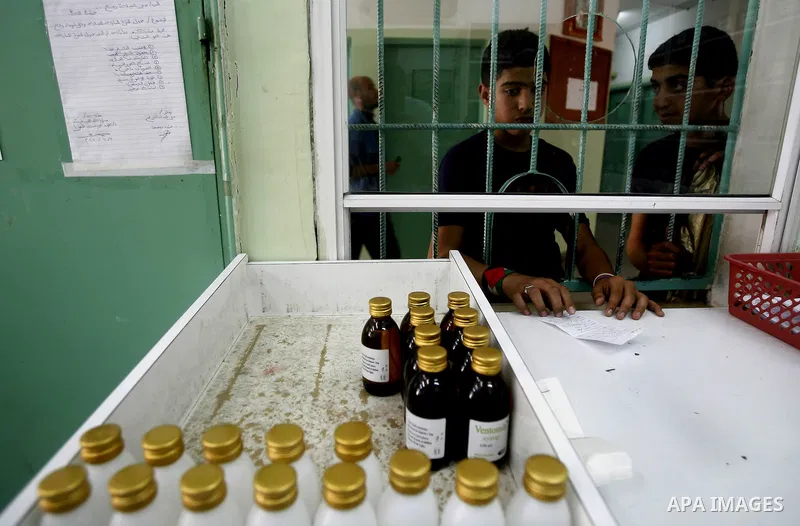 A Palestinian waits for medicines in hospital in Rafah southern Gaza Strip on April, 15, 2012 as Gaza Strip faces a lack of medicines. Photo by Eyad Al Baba