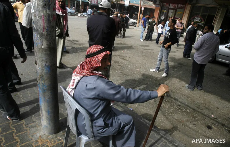 Palestinians wait a taxis in the street after the fuel shortage in Rafah in Gaza Strip on April, 15, 2012. Palestinians in the Gaza Strip are suffering a crisis of dry petrol pumps and frequent blackouts triggered by a f...