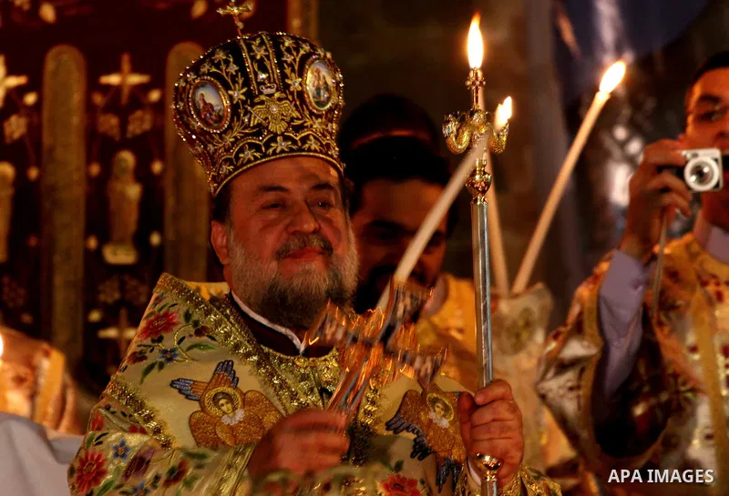 Palestinian Christians take part in the "Holy Fire" procession on the eve of Orthodox Easter in Gaza city on April 14, 2012. The date of Orthodox Easter is calculated differently than by the Roman Catholics and other chu...