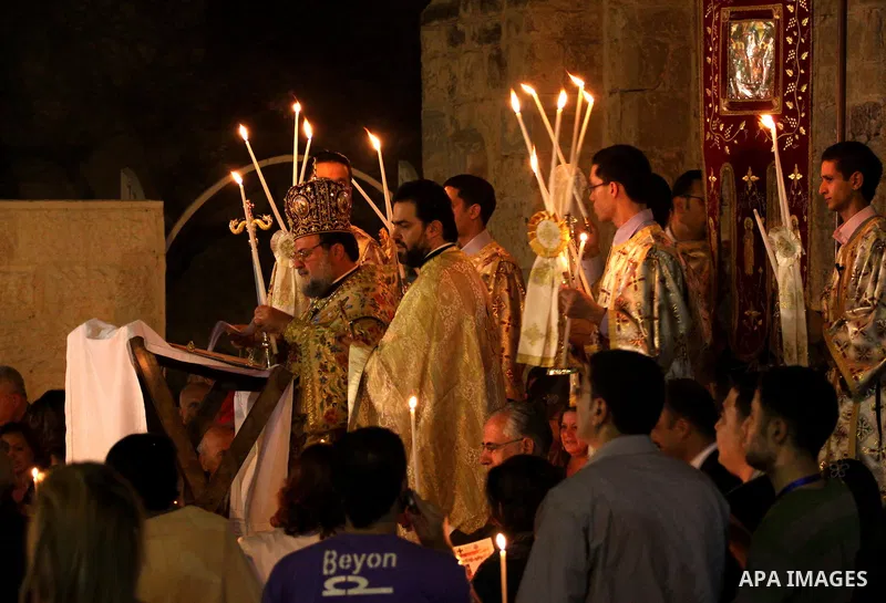 Palestinian Christians take part in the "Holy Fire" procession on the eve of Orthodox Easter in Gaza city on April 14, 2012. The date of Orthodox Easter is calculated differently than by the Roman Catholics and other chu...