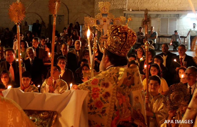 Palestinian Christians take part in the "Holy Fire" procession on the eve of Orthodox Easter in Gaza city on April 14, 2012. The date of Orthodox Easter is calculated differently than by the Roman Catholics and other chu...