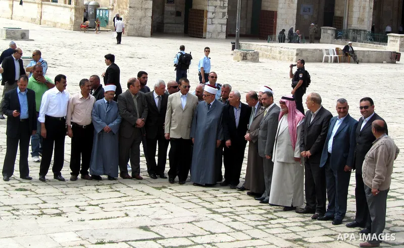 Jordan's Interior Minister Mohammad Raud (C) stands out of Al-Aqsa mosque during his visit to Jerusalem, on April 15, 2012. The Jordanian minister was on an official visit to the Palestinian Authority's capital Ramallah...