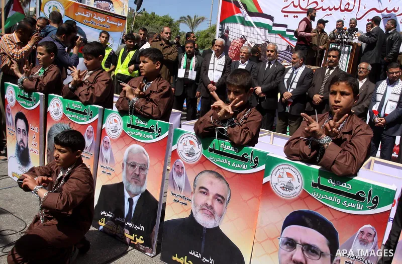 Palestinian children take part in a rally in front of the Red Cross headquarters in Gaza City marking Palestinian Prisoners Day April 17, 2012. The Israeli Prisons Authority said on Tuesday in a written statement that 2,...