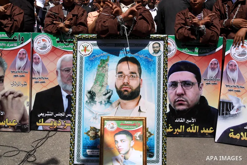 Palestinian children take part in a rally in front of the Red Cross headquarters in Gaza City marking Palestinian Prisoners Day April 17, 2012. The Israeli Prisons Authority said on Tuesday in a written statement that 2,...