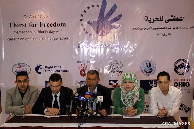 Palestinians take part in a press conference under the supervision of "Euro-Mediterranean" organization and 300 organization non-governmental entitled "Thirst for Freedom", to discuss issue of the prisoners in Israeli ja...