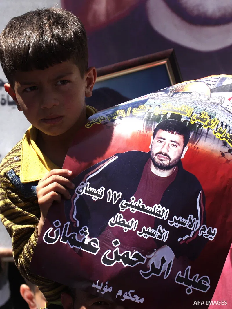 Palestinians participate in a demonstration calling for the release of Palestinian prisoners jailed in Israel, in the West Bank city of Nablus,Israel is currently 1,200 of Palestinians in its prisons. have begun a hunger...