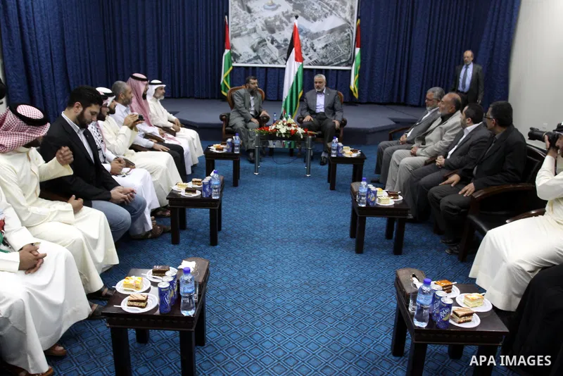 Palestinian Prime Minister in Gaza Strip, Ismail Haniya receives the Bahrani delegation in his office in Gaza city on April 18, 2012. Photo by Mohammed Asad