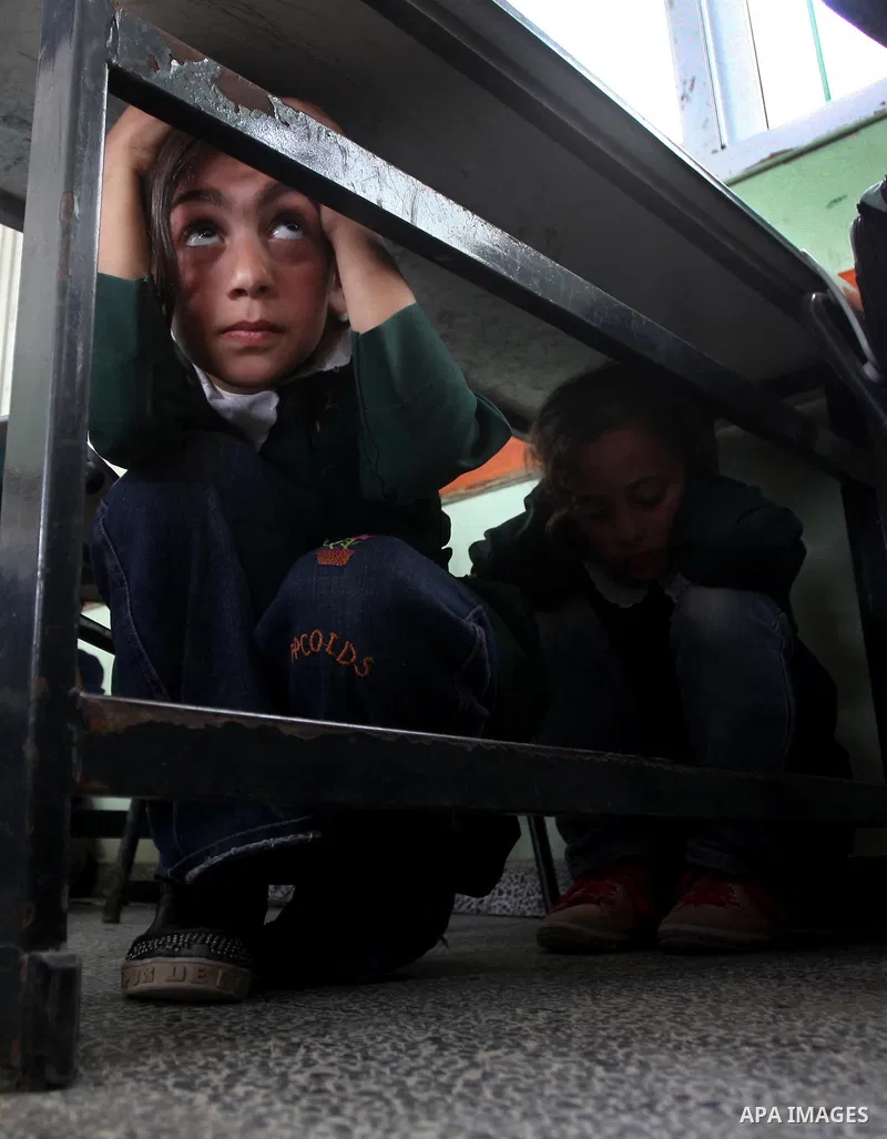 Ministry of The Education and the civil defense during campaign maneuver "for the protection of the safe evacuation of school children the Israeli attacks on Gaza, in Gaza city on April 18, 2012.. Photo by Ashraf Amra