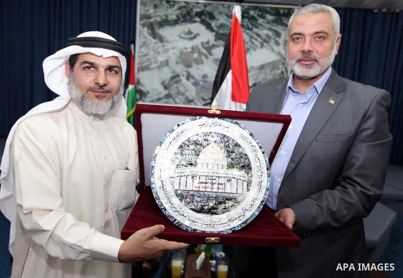 Palestinian Prime Minister in Gaza Strip, Ismail Haniya receives the Bahrani delegation in his office in Gaza city on April 18, 2012. Photo by Ahmad Shaat