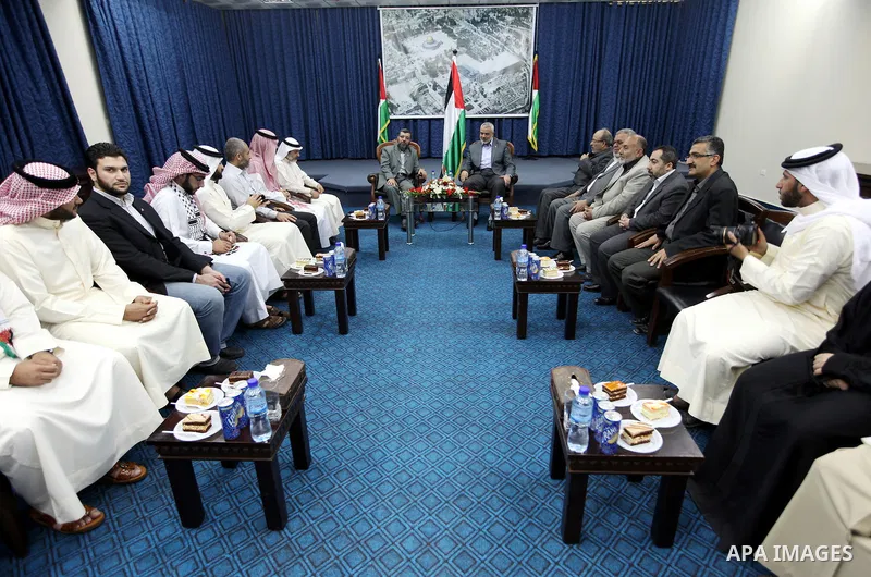 Palestinian Prime Minister in Gaza Strip, Ismail Haniya receives the Bahrani delegation in his office in Gaza city on April 18, 2012. Photo by Ahmad Shaat