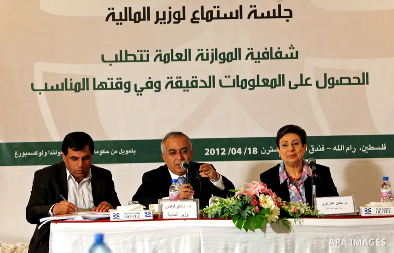 Palestinian Prime Minister Salam Fayyad speaks during a meeting about the Financial budget of year 2012, in the West Bank city of Ramallah. April 18, 2012. Photo by Mustafa Abu Dayeh
