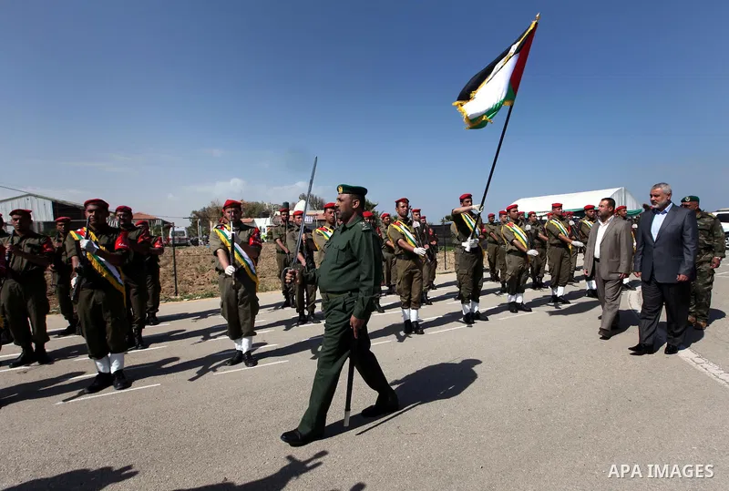 Palestinian Prime Minister in Gaza Strip, Ismail Haniya attends a graduation ceremony from a military course "Martyrs of Homeland Security" in Gaza City, on April, 19, 2012.. Photo by Ahmad Shaat